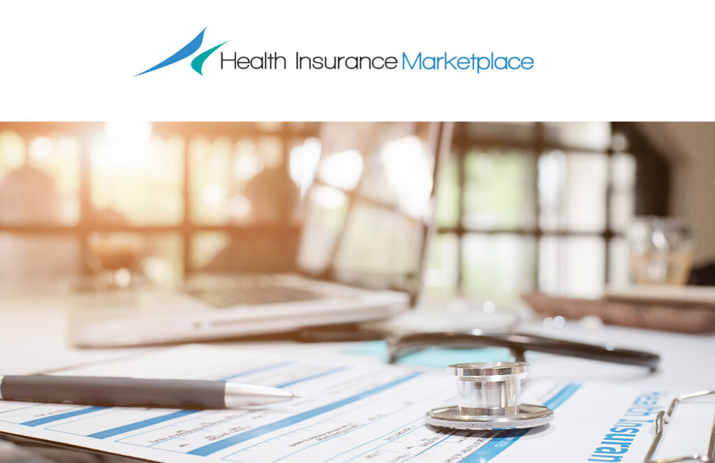 health insurance forms with stethoscope on table
